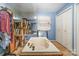 Bathroom with built-in bathtub, double vanity, and mirrored closet at 108 Leslie Dr, Shelby, NC 28152