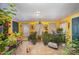 Bright sunroom filled with plants, tiled floor, and ample natural light at 108 Leslie Dr, Shelby, NC 28152