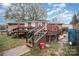 Back deck with stairs leading to backyard and a partially fenced area at 108 Leslie Dr, Shelby, NC 28152