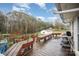 Wooden deck with benches overlooking a spacious backyard at 108 Leslie Dr, Shelby, NC 28152