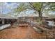 Backyard with various outbuildings and a small trailer at 108 Leslie Dr, Shelby, NC 28152