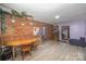 Dining room with brick wall and access to backyard at 108 Leslie Dr, Shelby, NC 28152