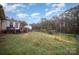 Spacious backyard with a deck and wooded area at 108 Leslie Dr, Shelby, NC 28152