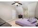 Bedroom with lavender bedding and built-in dresser at 2522 Green Point Ln, Denver, NC 28037