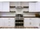 Modern kitchen with stainless steel appliances and dark wood countertops at 3995 Burton Ln, Denver, NC 28037