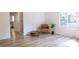 Living room features hardwood floors and a view into the kitchen at 3995 Burton Ln, Denver, NC 28037