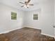 Spacious bedroom featuring hardwood floors and a ceiling fan at 4931 Mccormick Rd, Great Falls, SC 29055