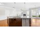 Large kitchen island with granite countertop and stainless steel dishwasher at 1007 Preakness Blvd, Indian Trail, NC 28079