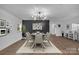 Bright dining room features a modern chandelier and stylish decor at 1047 Poplar Springs Church Rd, Shelby, NC 28152