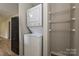 Laundry closet with stackable washer and dryer at 1211 Soulsville St, Rock Hill, SC 29732