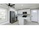 Modern kitchen with stainless steel appliances and an island at 3728 Woodleaf Rd, Charlotte, NC 28205