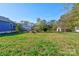 Large backyard with shed and privacy fence at 710 W Elm St, Shelby, NC 28150