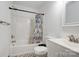 Bathroom featuring a bathtub, toilet and vanity at 710 W Elm St, Shelby, NC 28150