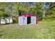 Metal storage shed in backyard, providing extra storage space at 710 W Elm St, Shelby, NC 28150