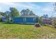 Spacious backyard with room for activities and gardening at 710 W Elm St, Shelby, NC 28150