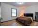 Cozy bedroom with a double bed and ample natural light at 710 W Elm St, Shelby, NC 28150