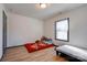 Bedroom with twin beds, one with a floral coverlet at 710 W Elm St, Shelby, NC 28150