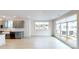 Modern kitchen featuring gray cabinets, quartz countertops, and a farmhouse sink at 1023 Wesley Terrace Ave, Charlotte, NC 28208