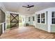 Screened porch with wooden deck and ceiling fan at 3172 Merritt Ln, Lancaster, SC 29720