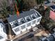 High angle aerial perspective of a rooftop deck of a white townhome at 1419 Collier Walk Aly # Csw0208, Charlotte, NC 28205