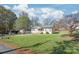 Tan house exterior with front yard and driveway at 314 Echo Ave, Kannapolis, NC 28081