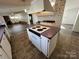 View of kitchen island with four-burner cooktop and oven at 36245 Nugget Rd # 2, New London, NC 28127