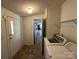 Neat laundry room with washer, dryer, and access to the exterior at 36245 Nugget Rd # 2, New London, NC 28127