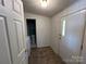 Laundry area with washer, dryer, and access to a bathroom at 36245 Nugget Rd # 2, New London, NC 28127