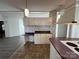 White kitchen cabinets and a decorative backsplash at 36245 Nugget Rd # 2, New London, NC 28127