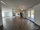 Open concept kitchen with island and access to living area at 36245 Nugget Rd # 2, New London, NC 28127
