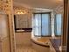 Bathroom features a bathtub, vanity, and shower at 36245 Nugget Rd # 2, New London, NC 28127