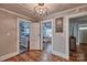 Hallway with views into bathroom and bedroom at 601 W Church St, Kershaw, SC 29067