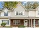 Front view of charming two story townhouse at 6826 Cypress Tree Ln, Charlotte, NC 28215