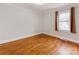 Light-filled bedroom featuring hardwood floors and a window at 808 Linwood Rd, Kings Mountain, NC 28086