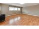 Living room with hardwood floors and a free-standing wood stove at 808 Linwood Rd, Kings Mountain, NC 28086