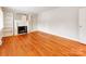 Spacious living room with hardwood floors and fireplace at 808 Linwood Rd, Kings Mountain, NC 28086