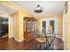 Charming dining area with hardwood floors and a built-in hutch at 9009 Quail Roost Dr, Waxhaw, NC 28173