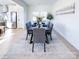 Light-filled dining room with a six-person table and an open view to the kitchen at Lot 3 Solitude Ct, Kannapolis, NC 28081