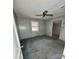 Bedroom with wood paneling, carpet, and large window at 1060 Mcdow Dr, Rock Hill, SC 29732