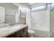 Guest bathroom with tub, shower, and granite countertop at 1217 Rosecliff Dr, Waxhaw, NC 28173