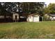 Large backyard with storage shed and a detached garage at 1572 W Lakewood Dr # 19, Rock Hill, SC 29732
