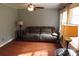 Living room with hardwood floors and a comfy couch at 1572 W Lakewood Dr # 19, Rock Hill, SC 29732