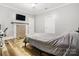 Bedroom with wood-look floors, a fireplace and large TV at 3635 Tryon Courthouse Rd, Cherryville, NC 28021