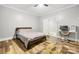 Bedroom with wood-look floors, ceiling fan and workspace at 3635 Tryon Courthouse Rd, Cherryville, NC 28021