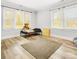 Bedroom with wood-look floors and large windows at 3635 Tryon Courthouse Rd, Cherryville, NC 28021
