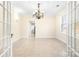 Bright dining room with tile floors and a chandelier at 3635 Tryon Courthouse Rd, Cherryville, NC 28021