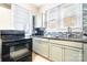 Updated kitchen features modern appliances and granite countertops at 3635 Tryon Courthouse Rd, Cherryville, NC 28021