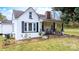 Charming white brick home with black shutters and porch at 3635 Tryon Courthouse Rd, Cherryville, NC 28021