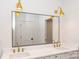 Modern bathroom featuring a double vanity with quartz countertop and sleek gold fixtures at 106 Pinecrest Dr, Shelby, NC 28152