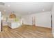 Open concept kitchen with white cabinets and island at 106 Pinecrest Dr, Shelby, NC 28152